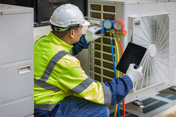 Professional Ac Installation technician working in Pepperell, MA
